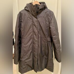 The North Face Arctic Parka (700 Fill) with Zipper and Strong Magnetic Closures.